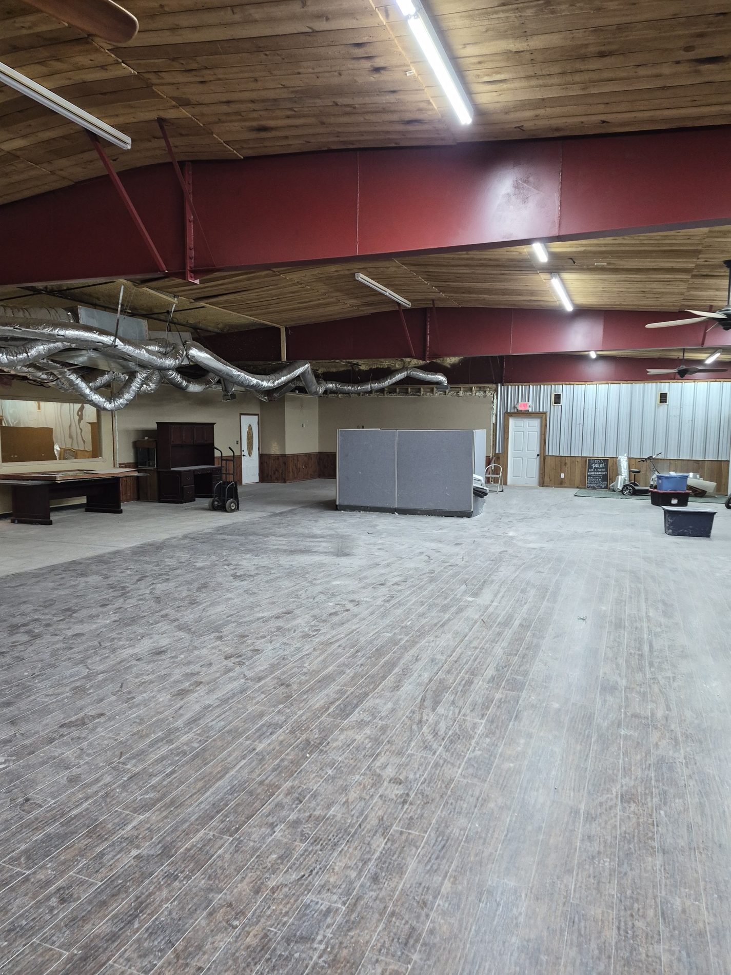 Open commercial floor swept clean after demolition