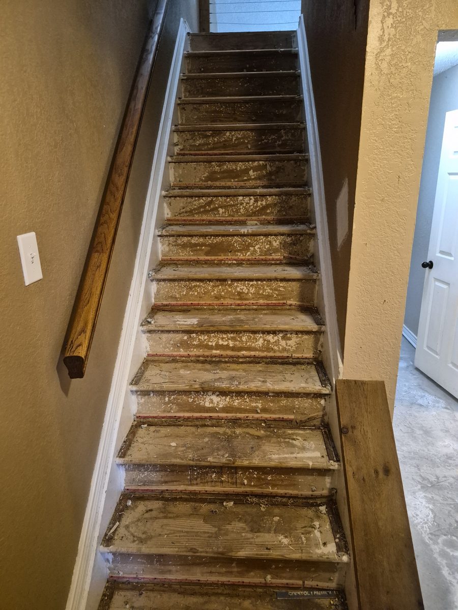 Staircase stripped down to bare treads